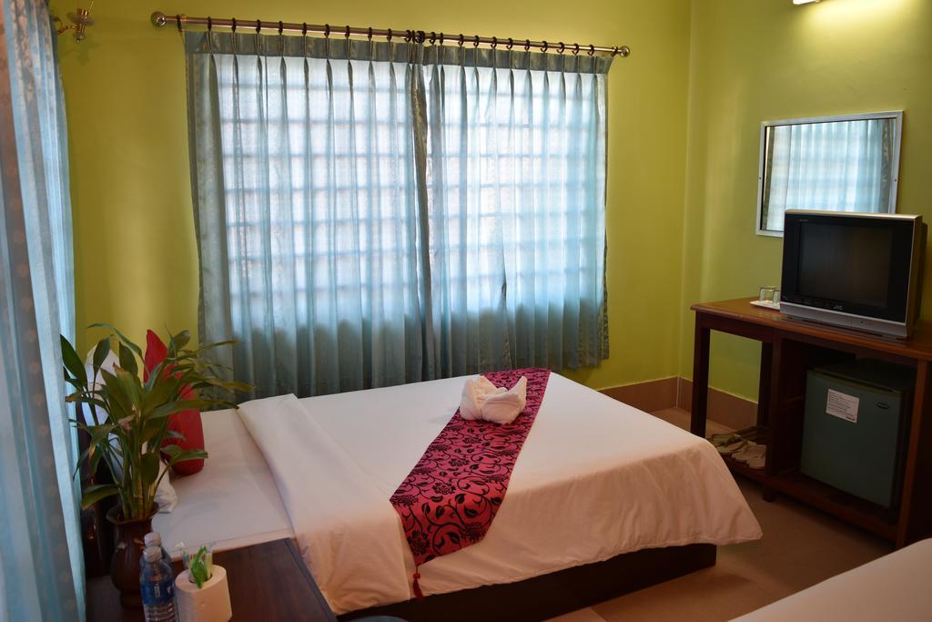 Ta Som Guesthouse & Tour Services Siem Reap Oda fotoğraf